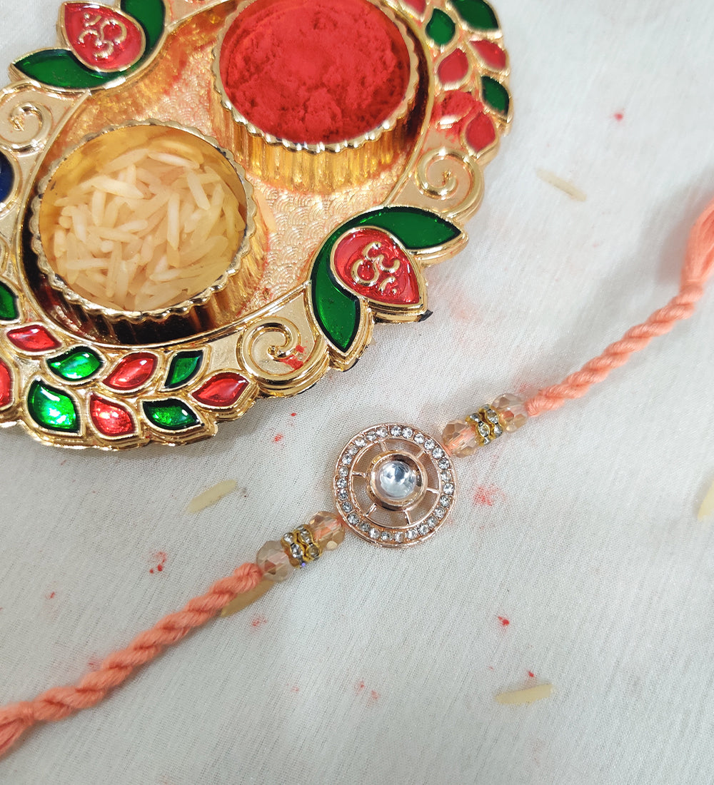 Stone Studded Thread Rakhi