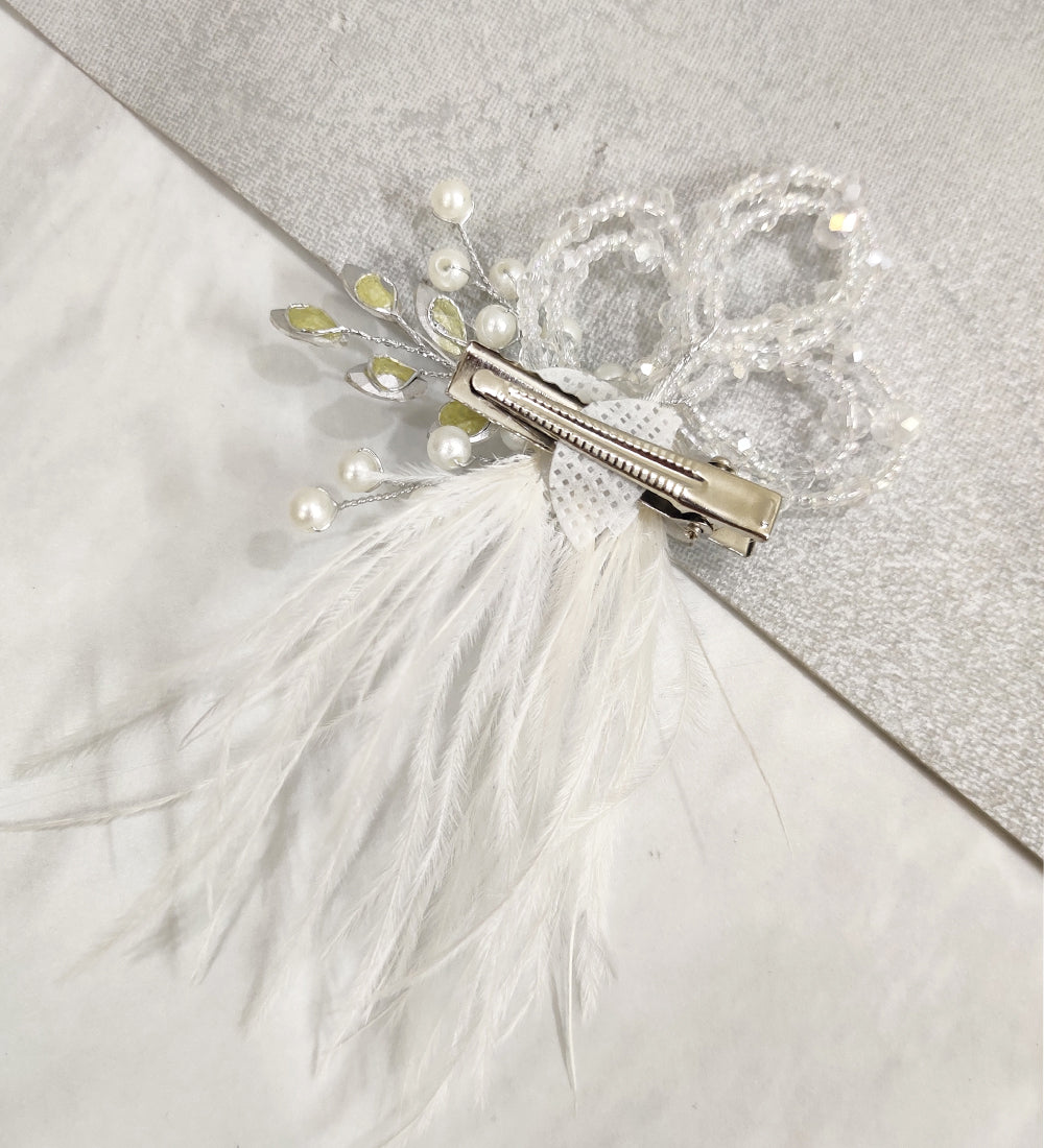 white feather hair clip for styling hair