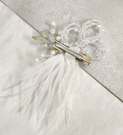 white feather hair clip for styling hair